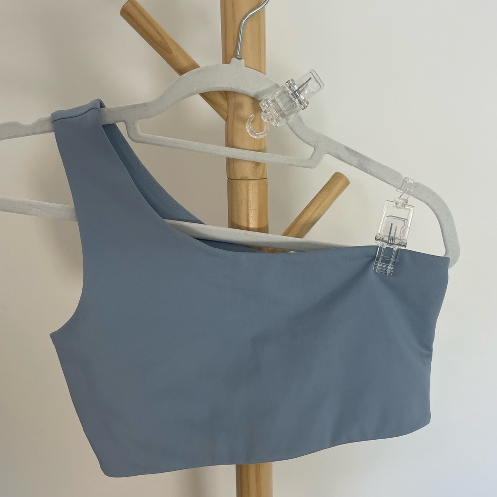 Girlfriend Collective light blue one-strap sports bra